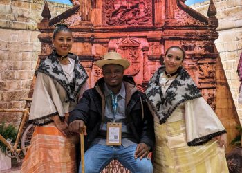 Akesse Sanza poses at the Philippines stands at WTM 2023